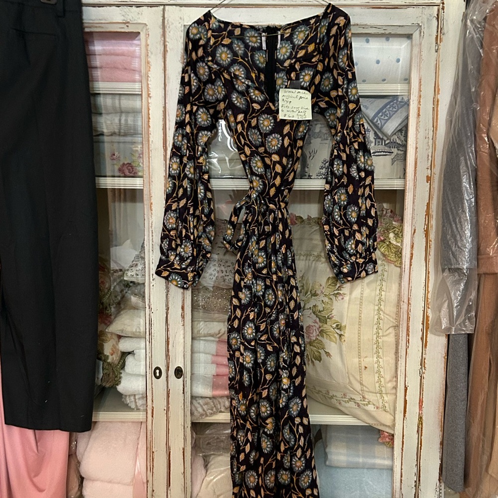 Great LIDO dress with belt. Multi  colored with belt . Fits a size 6